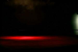 en mörk rum med en röd ljus på de golv. ai genererad foto