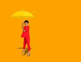 pojke mode en kinesisk stil skjorta innehav en gul paraply poser för en Foto skjuta.