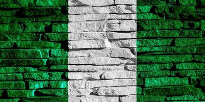 flagga av statlig republik av nigeria på en texturerad bakgrund. begrepp collage. foto