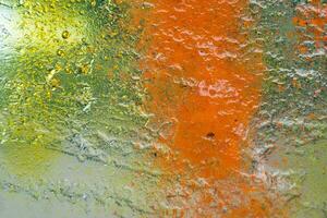 transparent orange gulgrön texturerad glas foto