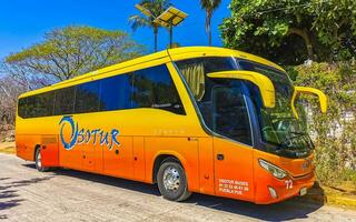 puerto escondido oaxaca mexico 2023 olika färgrik bussar Turné buss transport i puerto escondido Mexiko. foto