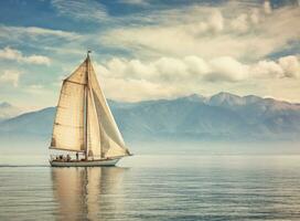 segling båt i de hav mot de bakgrund av berg. skapas med generativ ai teknologi. foto