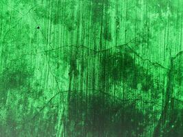 grön vägg med spricka textur foto