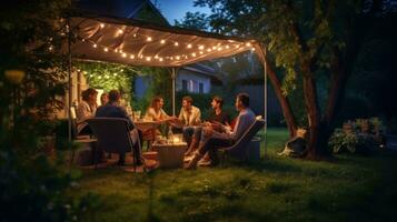 människor i picknick i trädgård foto