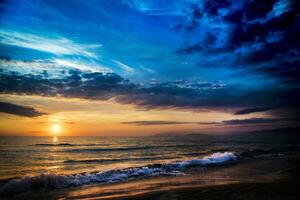 solnedgång vid havet foto