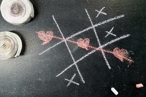 luffarschack spel med hjärta som en symbol foto