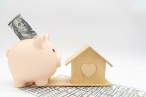budget planera för uppköp en Hem. begrepp av sparande pengar till köpa ett lägenhet, hus eller Övrig bostads- fast egendom. verklig egendom begrepp. foto