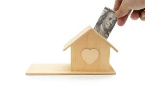 budget planera för uppköp en Hem. begrepp av sparande pengar till köpa ett lägenhet, hus eller Övrig bostads- fast egendom. verklig egendom begrepp. foto