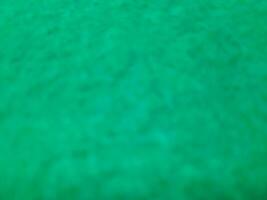 defocused abstrakt matta bakgrund i ljus tosca grön Färg foto