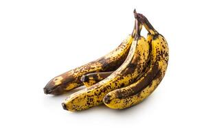 banan. över mogen bananer isolerat på vit med skuggor foto