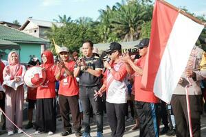 kuaro kalimantan timur, indonesien 17 augusti 2023. fira de 78: e indonesiska oberoende dag med de bybor foto