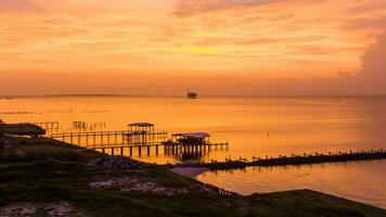 fort morgan strand på solnedgång i golf stränder, alabama foto