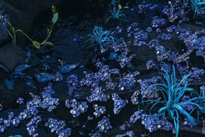 levande metallisk växter med mörk bakgrund, abstrakt befruktning, 3d tolkning. foto