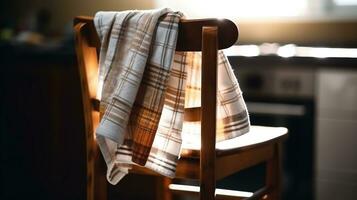 närbild av kök stol med handduk, servett på spika mot bakgrund o kök interiör. ai genererad. foto