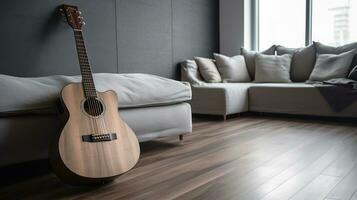 minimalistisk interiör design begrepp. akustisk gitarr på grå textil- soffa i rymlig rum av loft stil lägenhet med trä texturerad laminerad golv. ai generativ foto