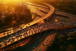 antenn se av motorväg med bilar rör på sig på väg på solnedgång. foto