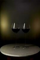 två glasögon av vin Sammanträde på topp av en tabell. ai genererad foto
