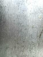 metall textur med damm repor och sprickor. foto