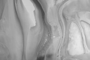 abstrakt skapas använder sig av de Metod av flytande akryl. makro fotografi av de minsta detaljer av en bild. de bild visar på vilket sätt svämmar över av nyanser och färger av måla likna Plats motiv. foto