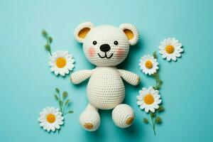 topp ner se av handgjord amigurumi teddy Björn med daisy på blå bakgrund ai genererad foto