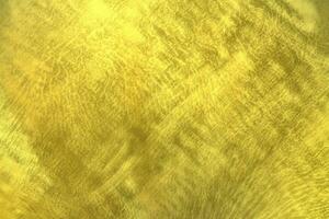 skinande gyllene metall vägg textur bakgrund, guld mönster foto