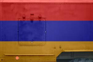 armenia flagga avbildad på sida del av militär armerad lastbil närbild. armén krafter konceptuell bakgrund foto