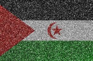 Västra sahara flagga avbildad på många små skinande paljetter. färgrik festival bakgrund för fest foto