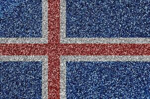 island flagga avbildad på många små skinande paljetter. färgrik festival bakgrund för fest foto