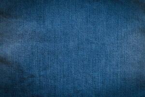 yta av blå jeans för design foto