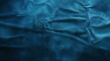 mörk blå mjuk plysch skrynkliga tyg omslag texturerad bakgrund foto