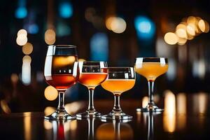 fyra glasögon av annorlunda alkoholhaltig drycker på en tabell. ai-genererad foto