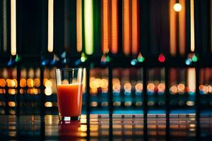 en glas av orange juice Sammanträde på en tabell i främre av en färgrik bakgrund. ai-genererad foto