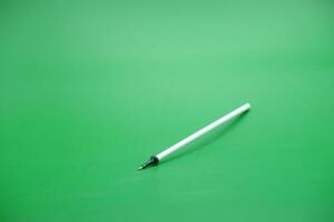 penna påfyllning isolerat grön bakgrund foto