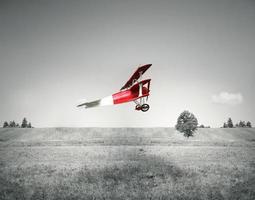 röd vintage flygplan foto