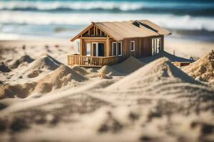 en miniatyr- hus sitter i de sand på de strand. ai-genererad foto