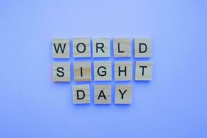 oktober 12, värld syn dag, minimalistisk baner med de inskrift i trä- brev foto