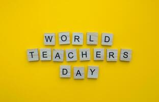 oktober 5, värld lärare dag, minimalistisk baner med de inskrift i trä- brev foto