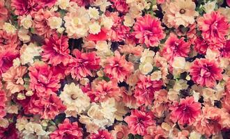 artificiell blommor vägg för bakgrund i årgång stil foto