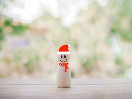 trä- snögubbe för jul dekorationer bakgrund foto