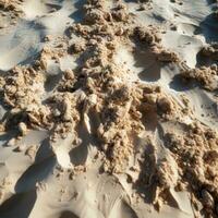 närbild av sand på de strand. textur, bakgrund.. fotspår på de sand. ai genererad foto