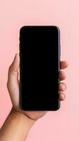 hand innehav smartphone med en svart tom skärm isolerat på en rosa bakgrund. ai genererad foto