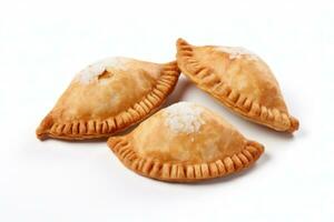 tre empanadas på en vit bakgrund ai genererad foto