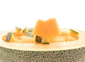 cantaloupmelon på vit bakgrund foto