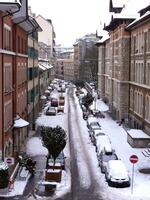 Genève snöig gata, schweiz foto