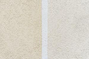 betong vägg textur detalj - naturlig stuck yta mönster bakgrund målad i två pastell foto