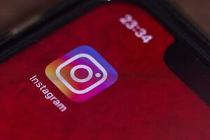 Instagram mobil Ansökan på smartphone skärm foto