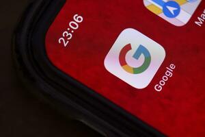 Google mobil Ansökan på smartphone skärm foto