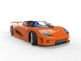 orange sportbil med blå säten foto