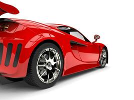 modern scharlakansrött röd sporter superbil - bak- hjul närbild skott foto