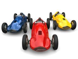 röd, blå och gul gammal skola årgång sporter bilar tävlings foto